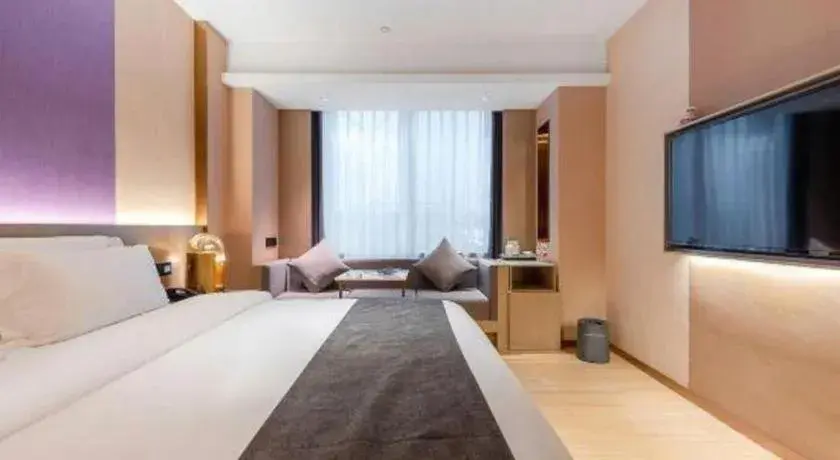 Bed in Borrman Hotel Zhongshan Lihe Plaza Bed in Borrman Hotel Zhongshan Lihe Plaza