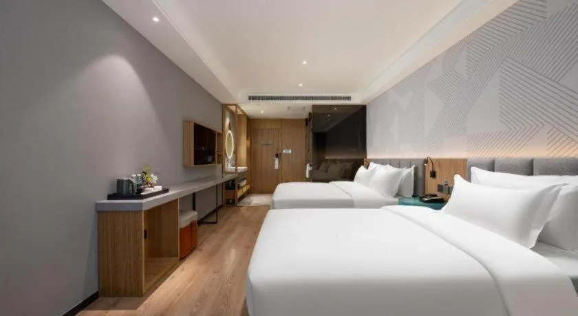 Bed in Borrman Hotel Beijing Guomao Jinsong Metro Station