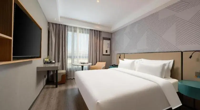 Bed in Borrman Hotel Beijing Guomao Jinsong Metro Station Bed in Borrman Hotel Beijing Guomao Jinsong Metro Station