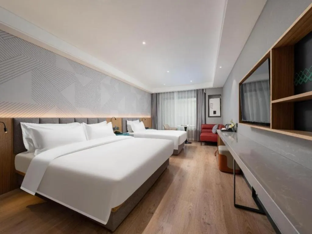 Bed in Borrman Hotel Beijing Guomao Jinsong Metro Station