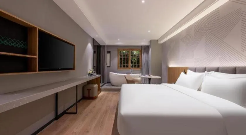 Bed in Borrman Hotel Beijing Guomao Jinsong Metro Station