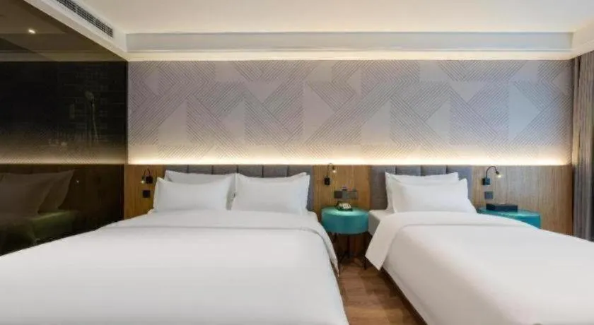 Bed in Borrman Hotel Beijing Guomao Jinsong Metro Station