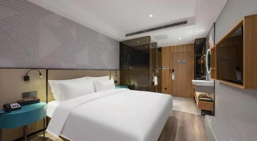 Bed in Borrman Hotel Beijing Guomao Jinsong Metro Station Bed in Borrman Hotel Beijing Guomao Jinsong Metro Station