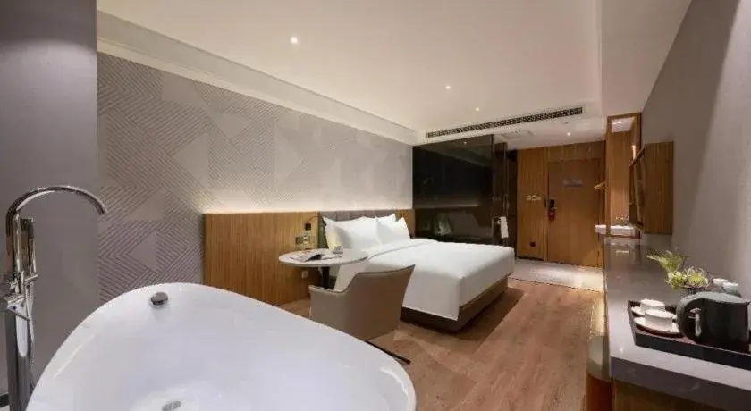 Bed in Borrman Hotel Beijing Guomao Jinsong Metro Station Bed in Borrman Hotel Beijing Guomao Jinsong Metro Station