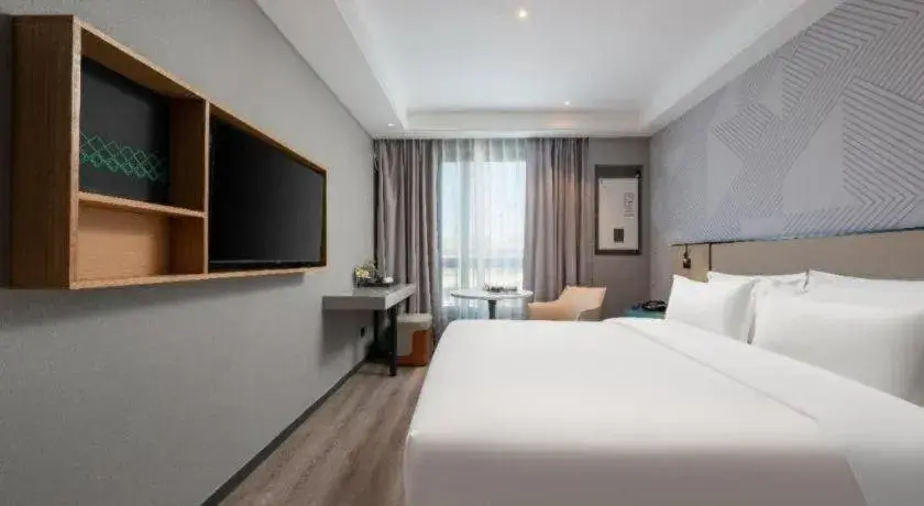 Bed in Borrman Hotel Beijing Guomao Jinsong Metro Station Bed in Borrman Hotel Beijing Guomao Jinsong Metro Station