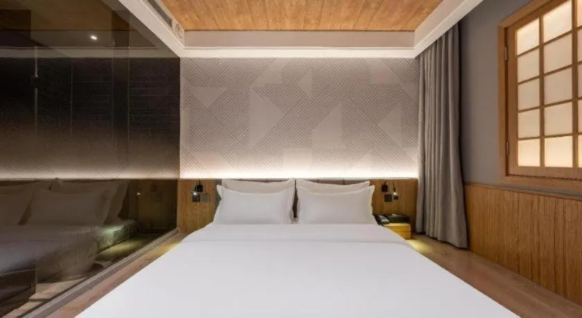 Bed in Borrman Hotel Beijing Guomao Jinsong Metro Station