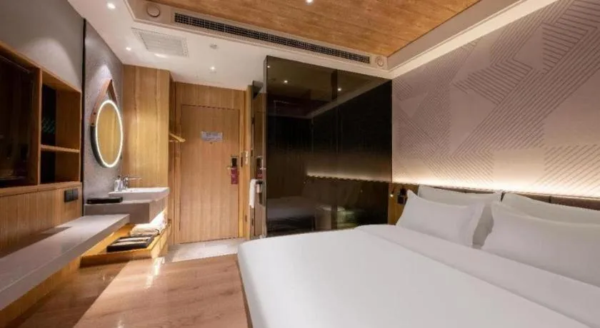 Bed in Borrman Hotel Beijing Guomao Jinsong Metro Station