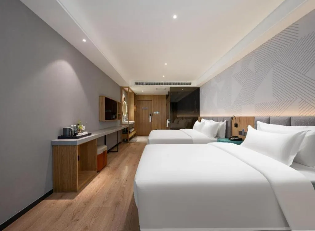 Bed in Borrman Hotel Beijing Guomao Jinsong Metro Station