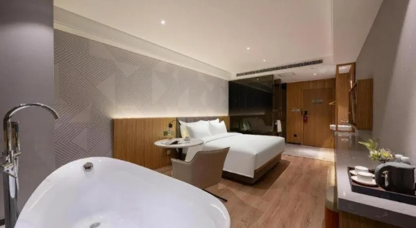 Bed in Borrman Hotel Beijing Guomao Jinsong Metro Station