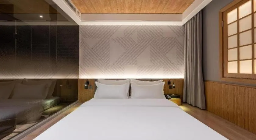 Bed in Borrman Hotel Beijing Guomao Jinsong Metro Station