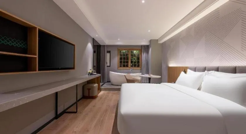 Bed in Borrman Hotel Beijing Guomao Jinsong Metro Station