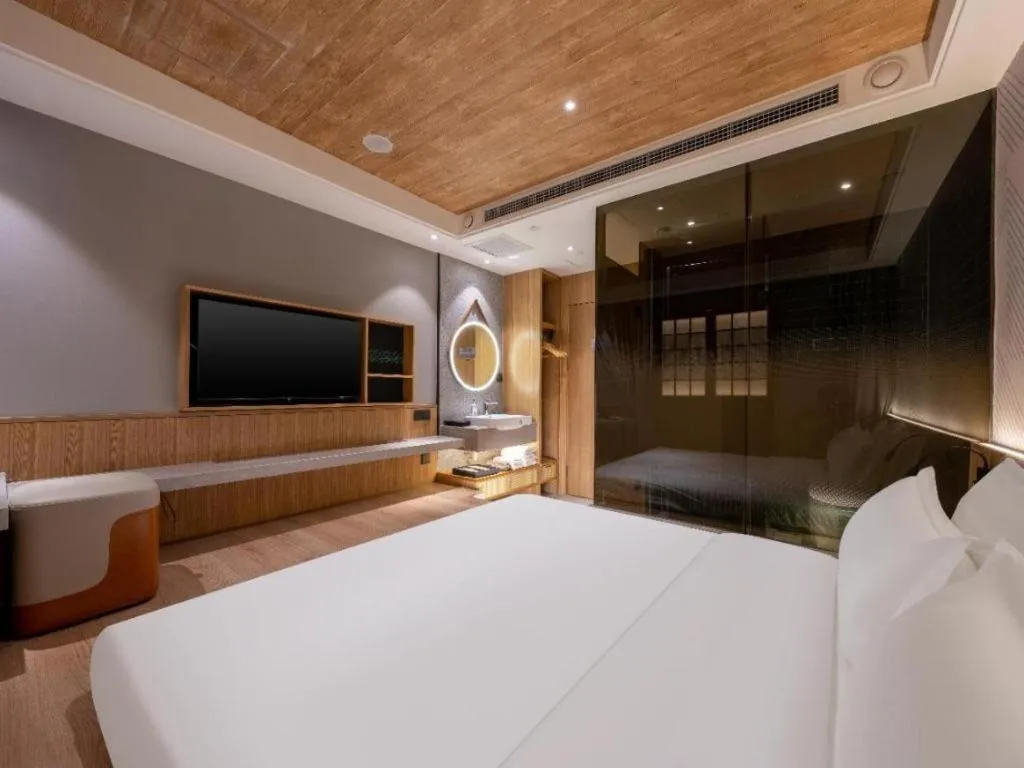 Bed in Borrman Hotel Beijing Guomao Jinsong Metro Station