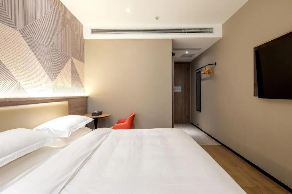 Bed in Borrman Hotel Korla Peacock River