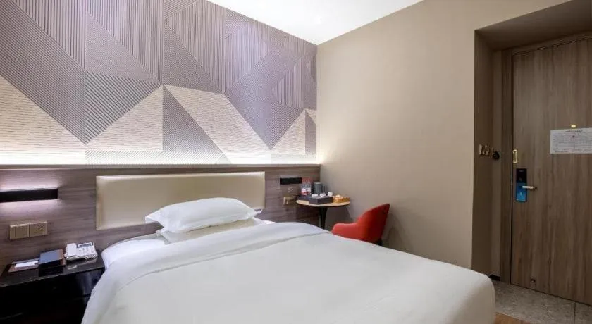 Bed in Borrman Hotel Korla Peacock River