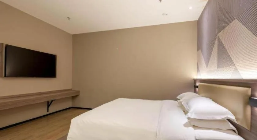 Bed in Borrman Hotel Korla Peacock River