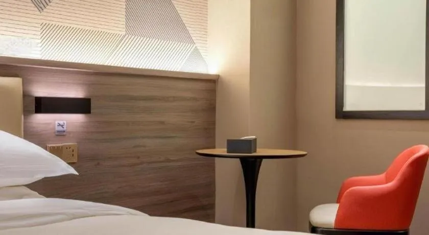 Bed in Borrman Hotel Korla Peacock River