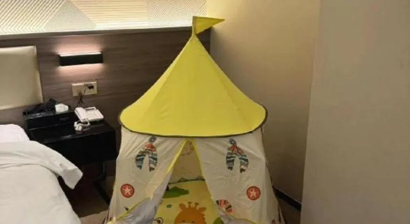 Bed in Borrman Hotel Korla Peacock River