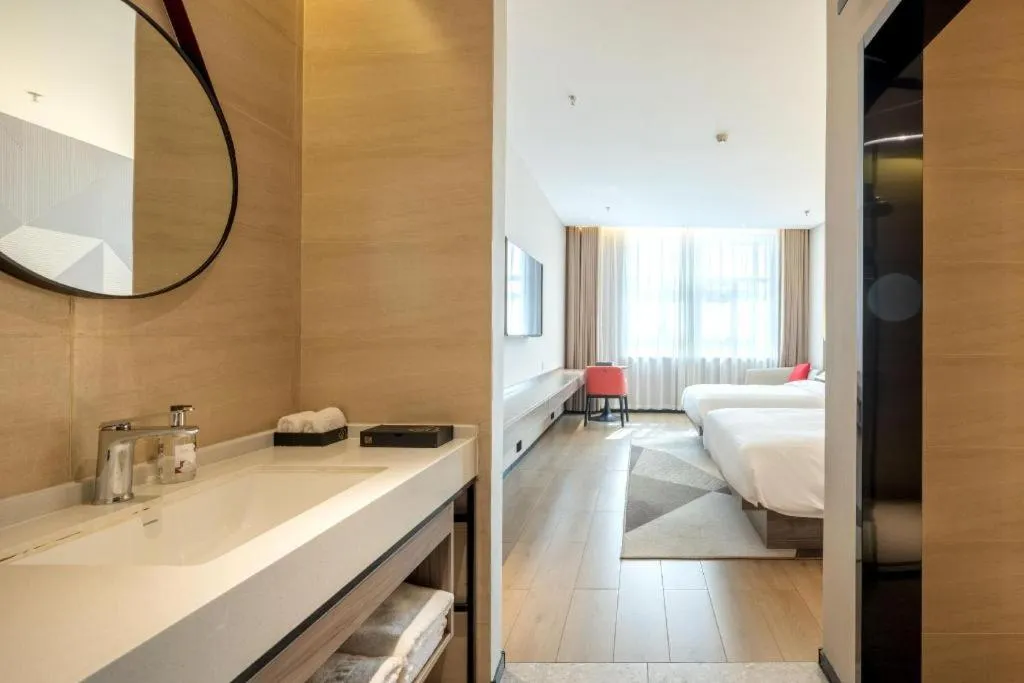 Bed in Borrman Hotel Korla Peacock River