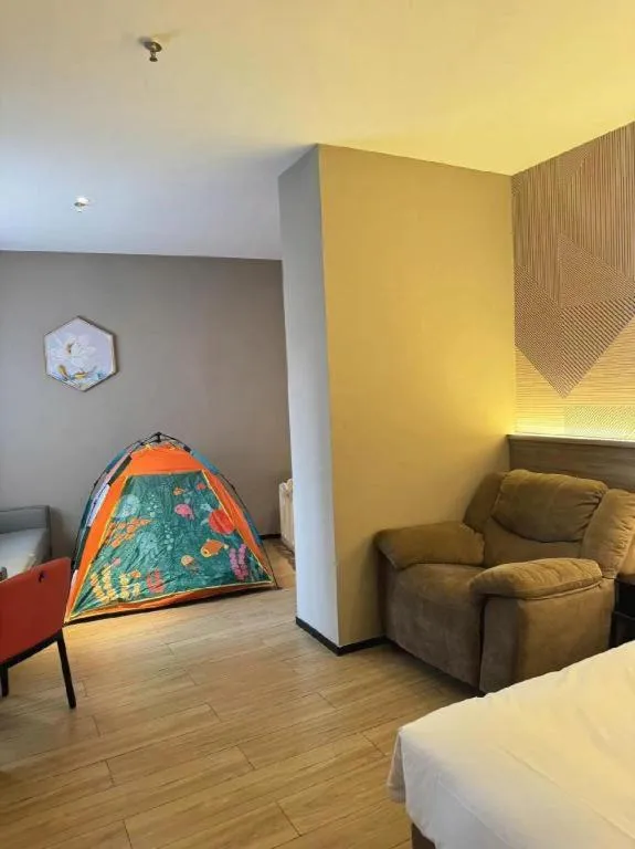 Bed in Borrman Hotel Korla Peacock River