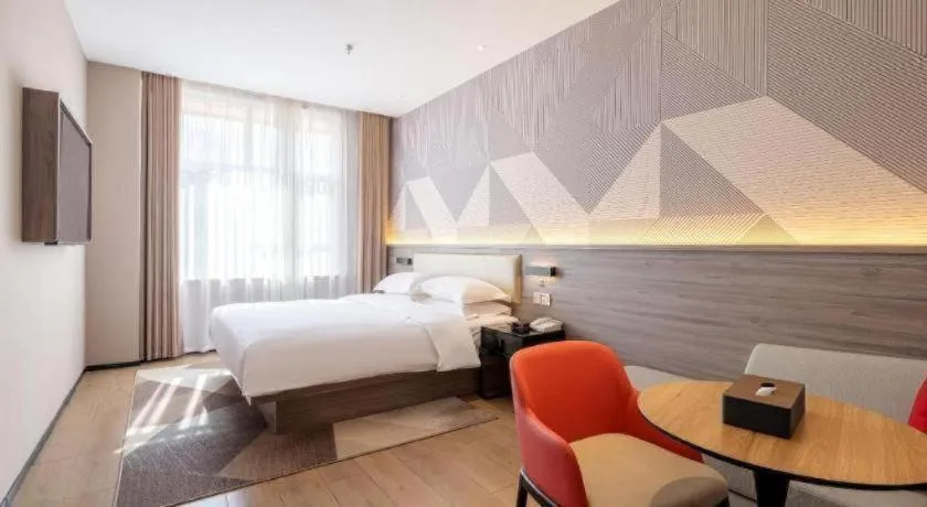 Bed in Borrman Hotel Korla Peacock River