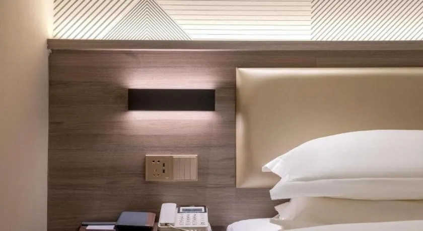 Bed in Borrman Hotel Korla Peacock River