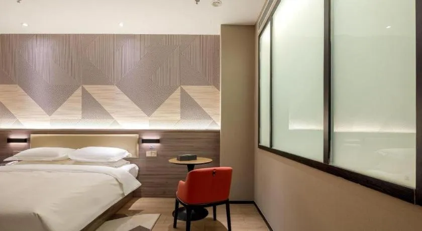 Bed in Borrman Hotel Korla Peacock River