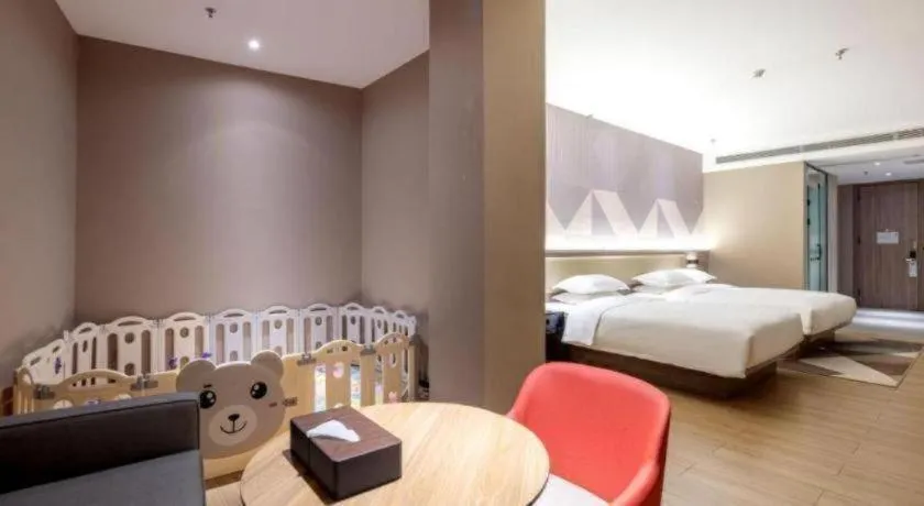 Bed in Borrman Hotel Korla Peacock River