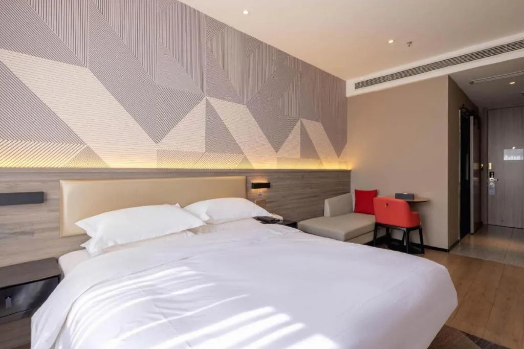 Bed in Borrman Hotel Korla Peacock River