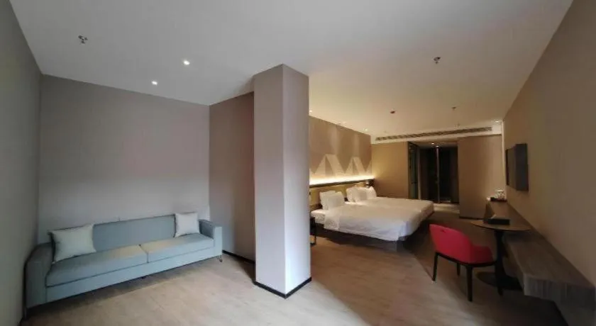 Bed in Borrman Hotel Korla Peacock River