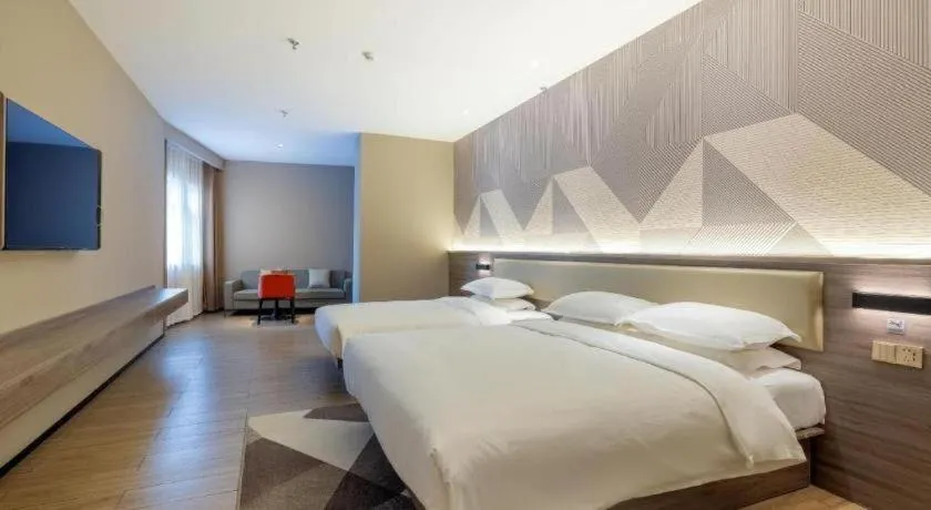 Bed in Borrman Hotel Korla Peacock River