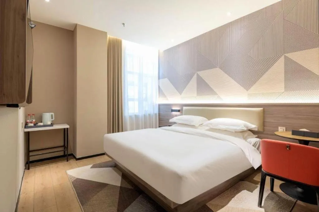 Bed in Borrman Hotel Korla Peacock River