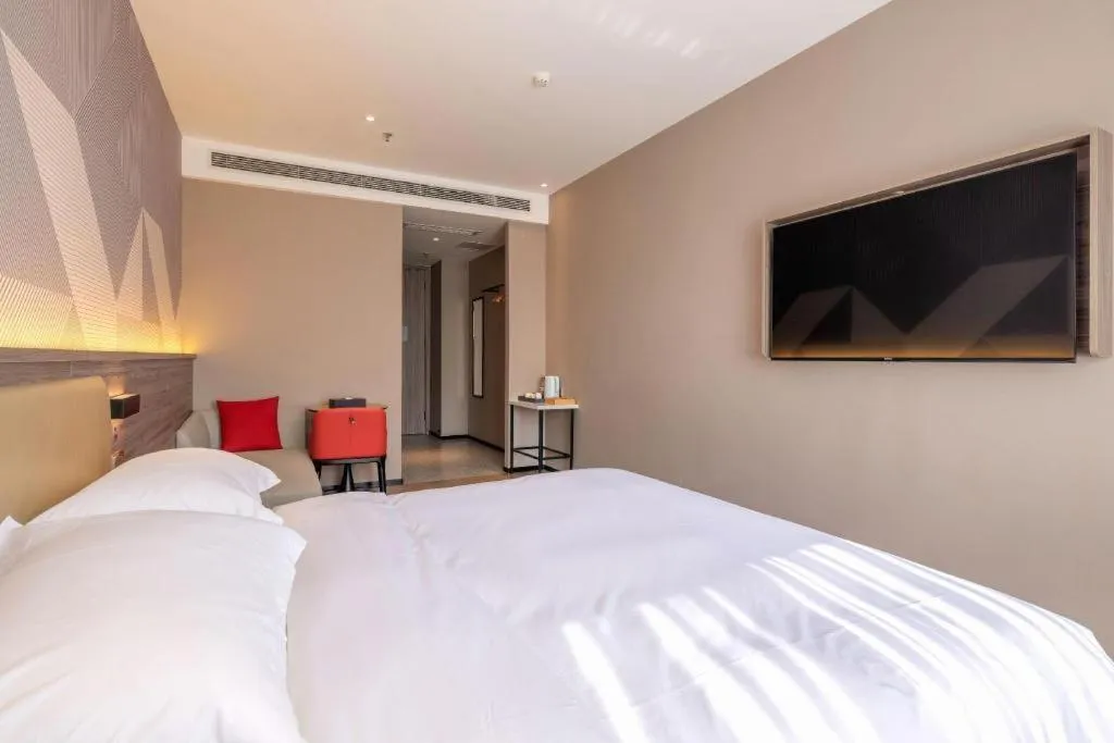 Bed in Borrman Hotel Korla Peacock River