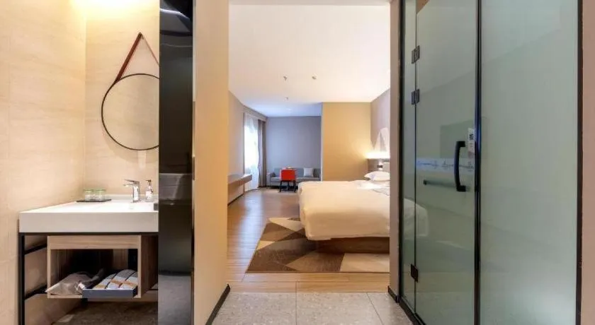 Bed in Borrman Hotel Korla Peacock River