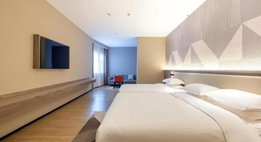 Bed in Borrman Hotel Korla Peacock River