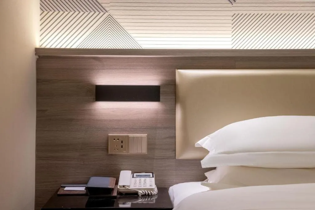 Bed in Borrman Hotel Korla Peacock River