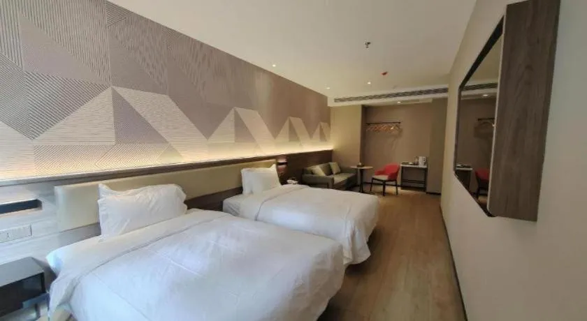 Bed in Borrman Hotel Korla Peacock River