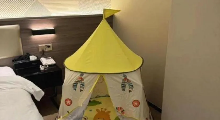 Bed in Borrman Hotel Korla Peacock River