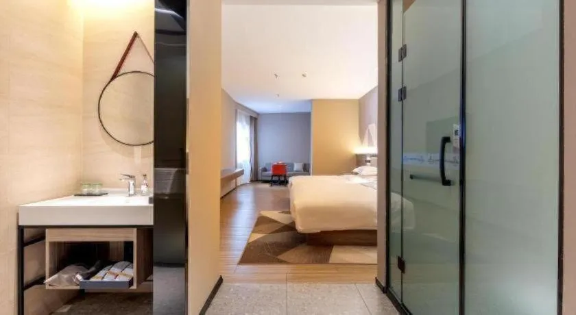 Bed in Borrman Hotel Korla Peacock River