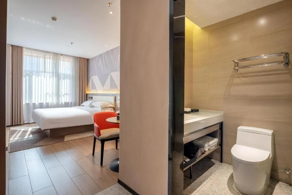 Bed in Borrman Hotel Korla Peacock River