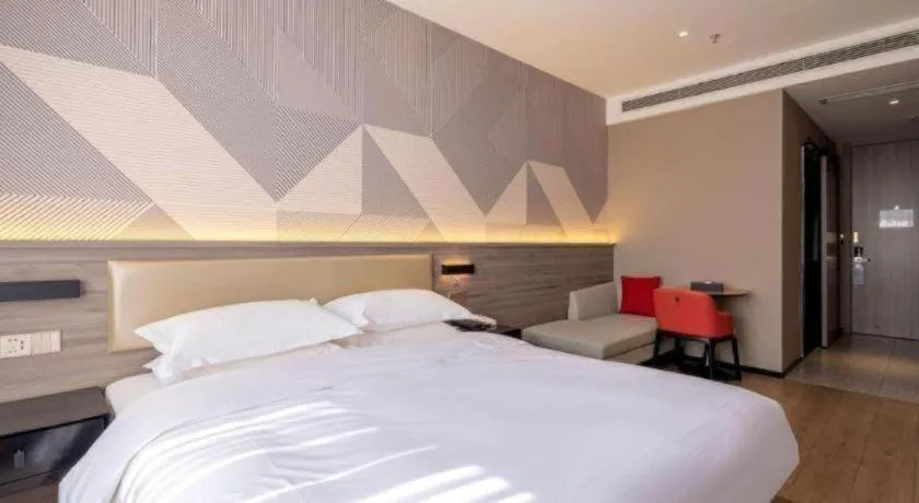 Bed in Borrman Hotel Korla Peacock River