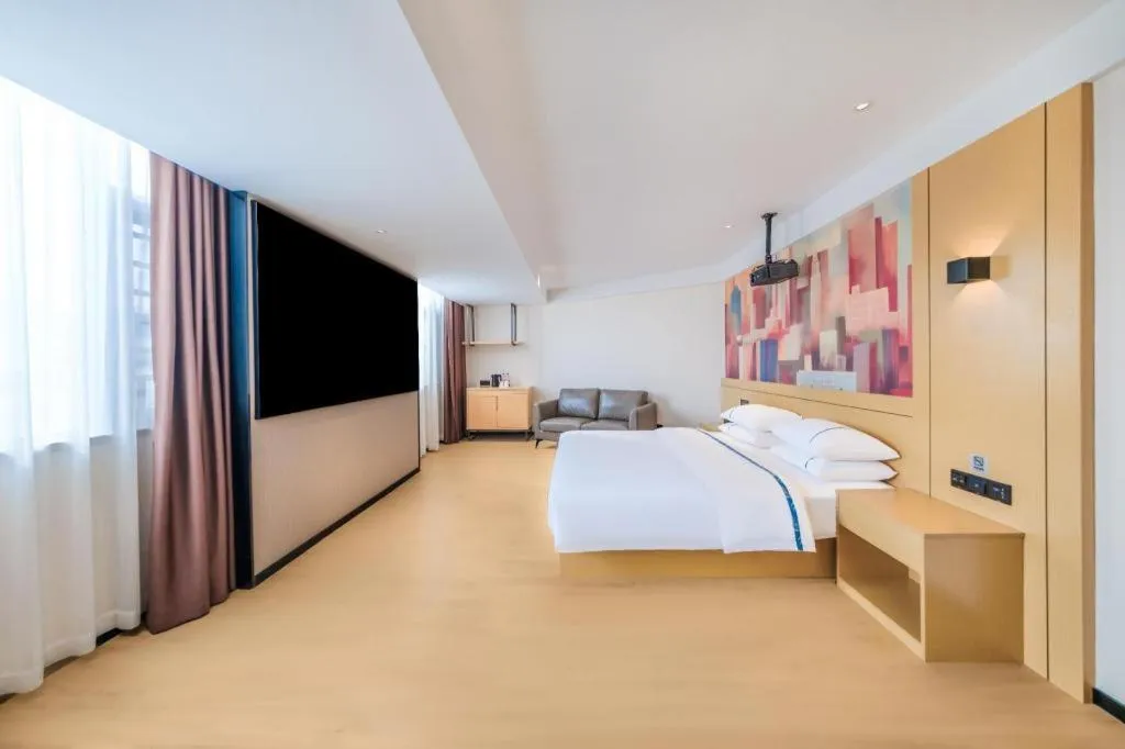 Bed in City Comfort Inn Huize Ancient City