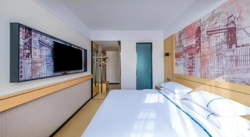 Bed in City Comfort Inn Huize Ancient City