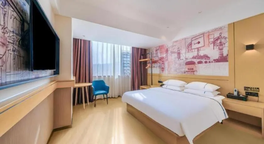 Bed in City Comfort Inn Huize Ancient City