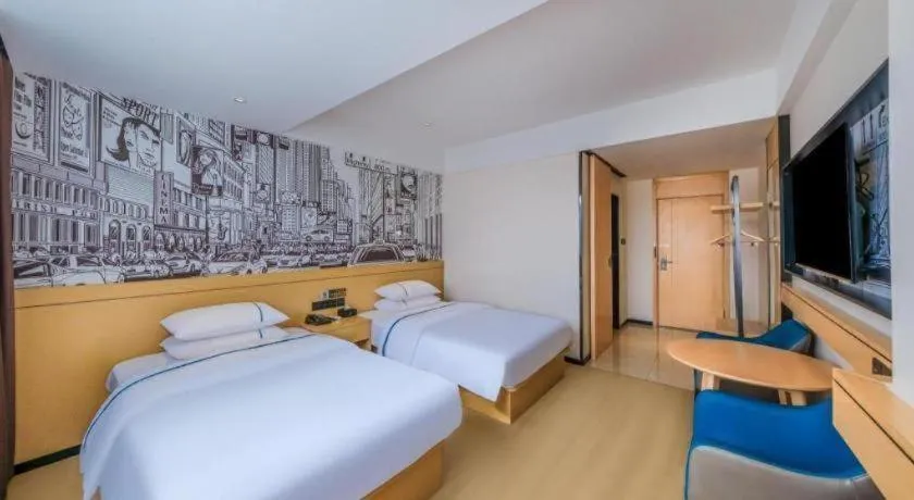 Bed in City Comfort Inn Huize Ancient City