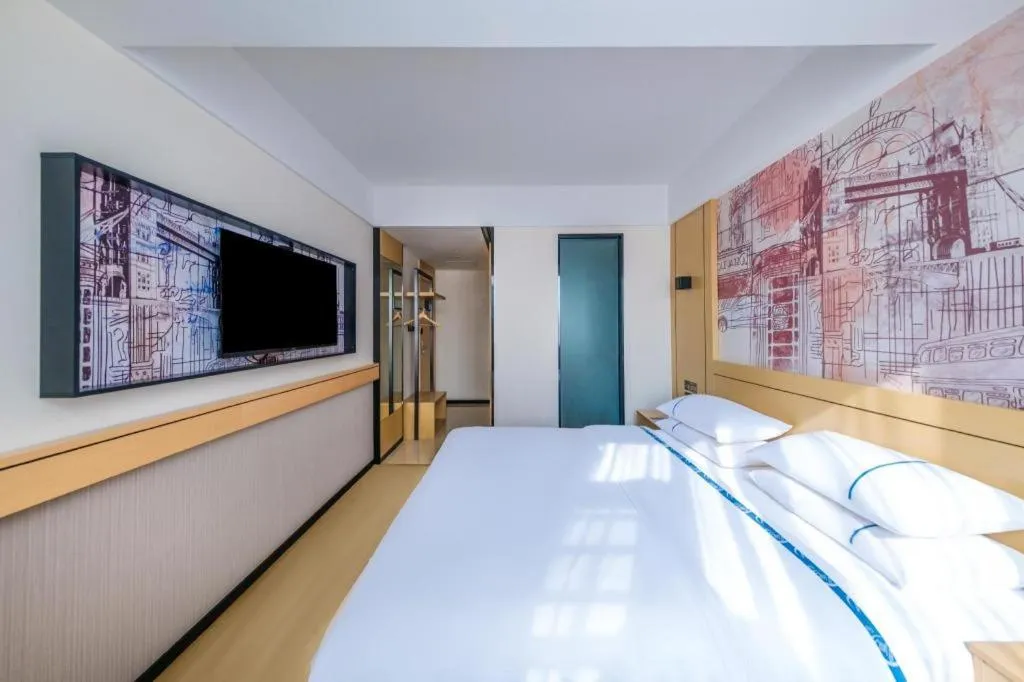 Bed in City Comfort Inn Huize Ancient City