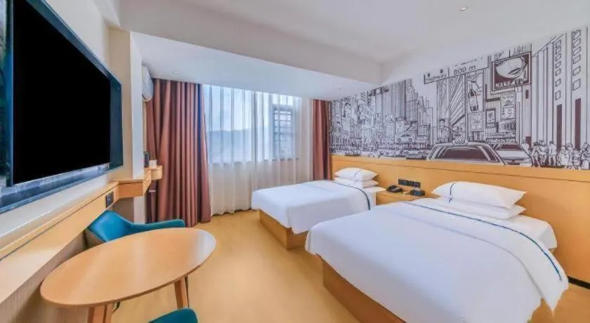 Bed in City Comfort Inn Huize Ancient City