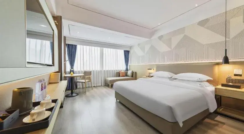 Bed in Borrman Hotel Wanning Wenming Road High-speed Railway Station Bed in Borrman Hotel Wanning Wenming Road High-speed Railway Station