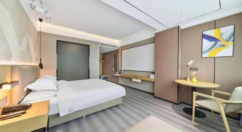 Bed in Borrman Hotel Wanning Wenming Road High-speed Railway Station Bed in Borrman Hotel Wanning Wenming Road High-speed Railway Station