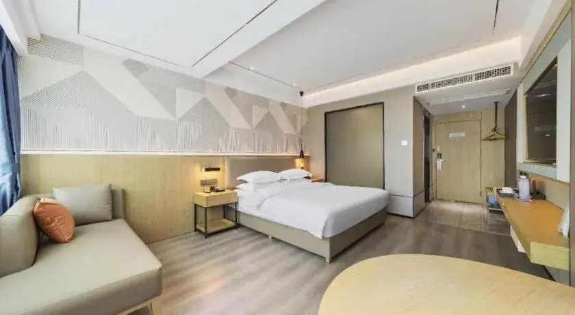 Bed in Borrman Hotel Wanning Wenming Road High-speed Railway Station Bed in Borrman Hotel Wanning Wenming Road High-speed Railway Station