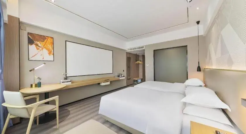Bed in Borrman Hotel Wanning Wenming Road High-speed Railway Station Bed in Borrman Hotel Wanning Wenming Road High-speed Railway Station